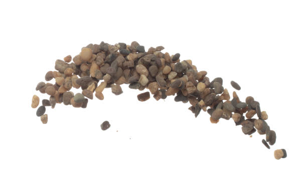 istock Fish Tank decorative Rock stone gravel fly explosion fall, brown stone rock explode abstract cloud fly, splash in air for ground floor. White background isolated high speed shutter freeze shot 1479335351