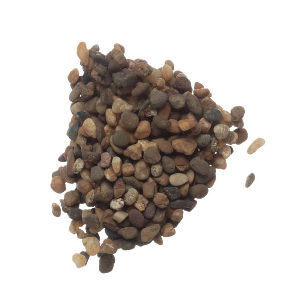 Fish Tank decorative Rock stone gravel fly explosion fall, brown stone rock explode abstract cloud fly, splash in air for ground floor. White background isolated high speed shutter freeze shot