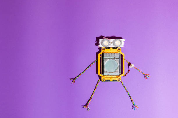 istock Stem robot flat lay on the purple background.Robotics and electronics. DIY robotics. STEM education for kids.Science, technology, engineering, mathematics concept.Copy space. 1479336853