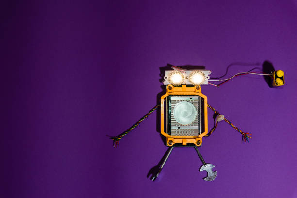 istock Stem robot flat lay on the purple background.Robotics and electronics. DIY robotics. STEM education for kids.Science, technology, engineering, mathematics concept.Copy space. 1479336857