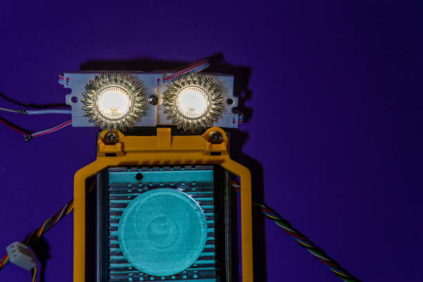 istock Hand made robot flat lay on the Open-sourced platform. DIY. AI. STEAM.purple background.Stem education for children and teenagers, robotics and electronics. 1479336877