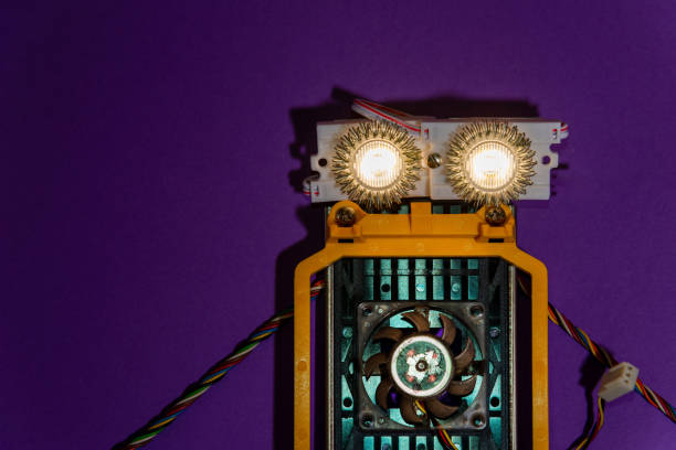 istock Hand made robot flat lay on the Open-sourced platform. DIY. AI. STEAM.purple background.Stem education for children and teenagers, robotics and electronics. 1479336879