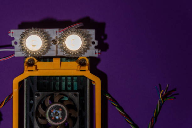 istock Hand made robot flat lay on the Open-sourced platform. DIY. AI. STEAM.Dark purple background.Stem education for children and teenagers, robotics and electronics. 1479336931