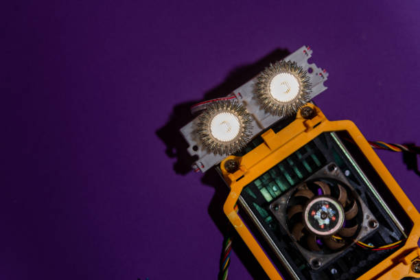 istock Hand made robot flat lay on the Open-sourced platform. DIY. AI. STEAM.Dark purple background.Stem education for children and teenagers, robotics and electronics.Copy space. 1479336976