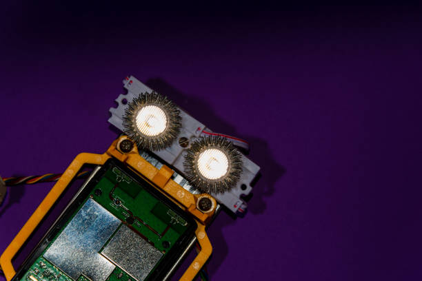 istock Hand made robot flat lay on the Open-sourced platform. DIY. AI. STEAM.purple dark background.Stem education for children and teenagers, robotics and electronics.Copy space. 1479336993