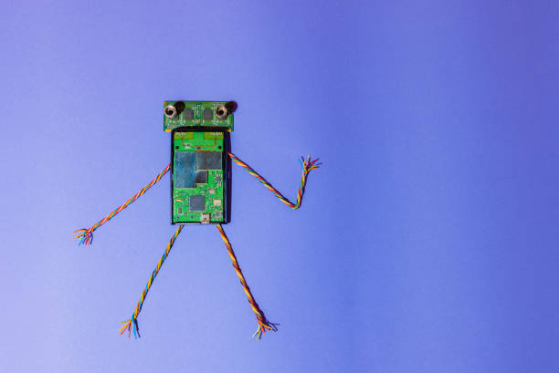 istock Hand made robot flat lay on the Open-sourced platform. DIY. AI. STEAM.purple background.Stem education for children and teenagers, robotics and electronics.Copy space. 1479336998