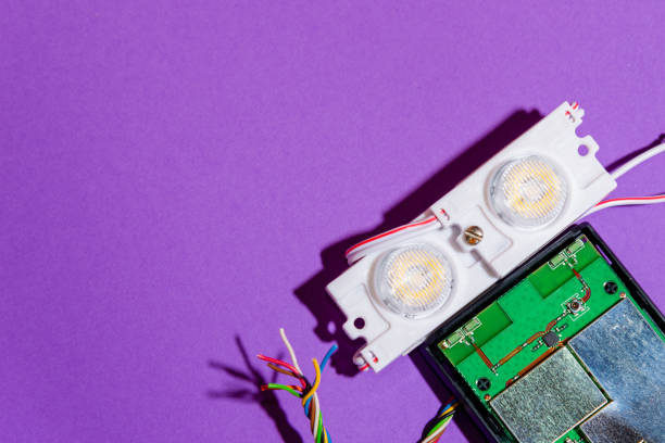 istock Hand made robot flat lay on the Open-sourced platform. DIY. AI. STEAM.purple background.Stem education for children and teenagers, robotics and electronics.Copy space. 1479337041