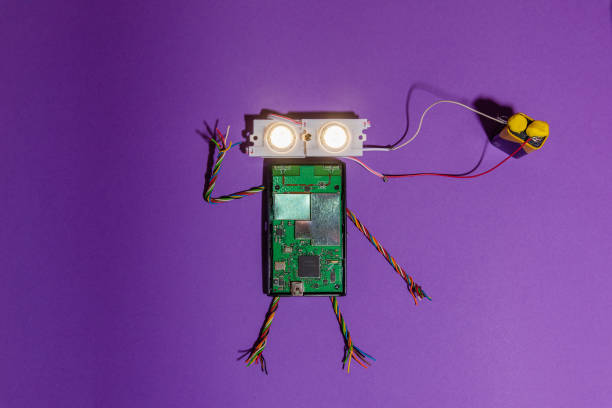 istock Hand made robot flat lay on the Open-sourced platform. DIY. AI. STEAM.purple background.Stem education for children and teenagers, robotics and electronics.Copy space. 1479337051