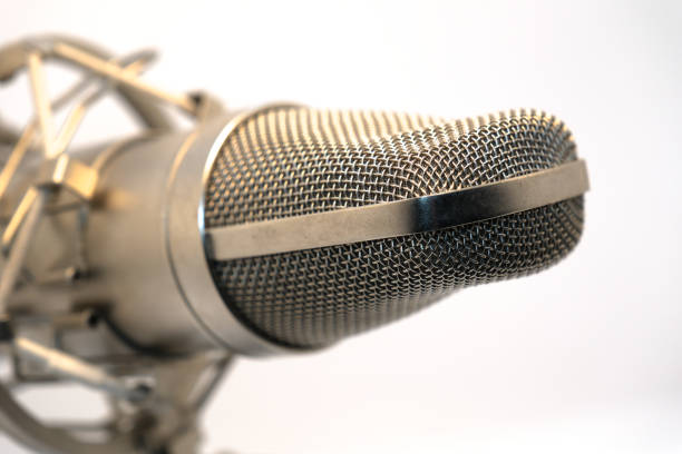 Silver studio condenser microphone isolated on white background stock photo