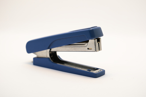 Office stationery stapler for papers isolated on a white background stock photo