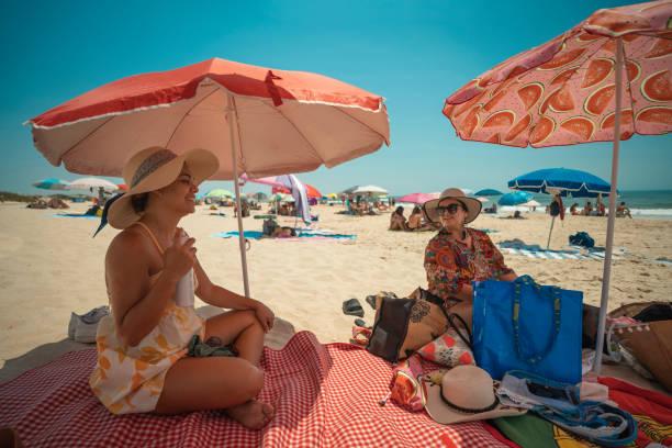 Tourists at Praia do Barril in Tavira, Portugal