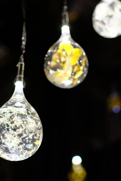 istock A vertical shot of white lit light bulbs 1479340938