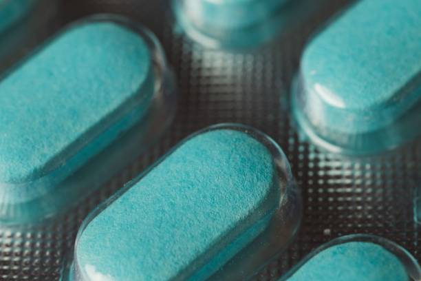 istock Closeup shot of blue pills 1479340983