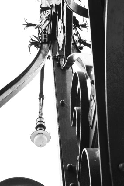 A grayscale shot of a vintage lamppo