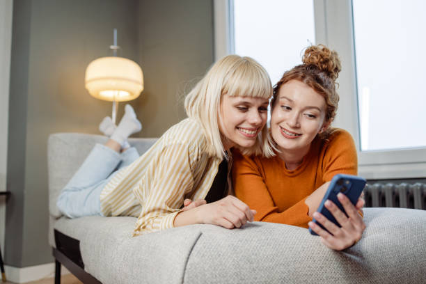 istock Friends looking at a phone 1479343057
