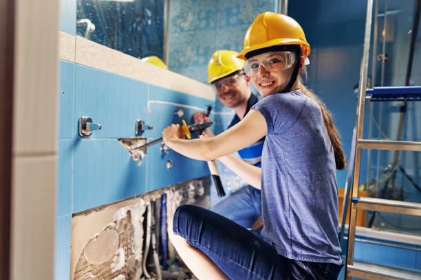 father and daughter doing some home demolition - renovation - home improvement work tool hammer portrait imagens e fotografias de stock