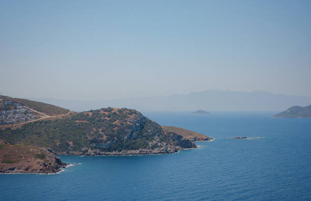 Bodrum summer travel to Turkey. Summer noon sea village Gumusluk Mugla province, bay with clear blue water