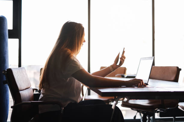 istock IT company manager communicates by video call with clients in modern office 1479344877