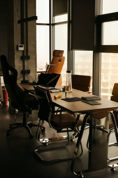 istock company director's office with empty desktop with panoramic windows at sunset 1479344953