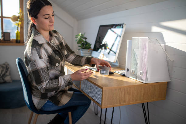 istock Woman taking a gummy snack 1479345839