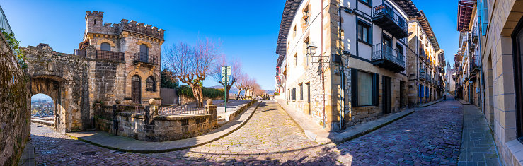 Fuenterrabia or Hondarribia municipality of Gipuzkoa. Basque Country. Panoramic of the main street and the door in the wall of Santa Maria