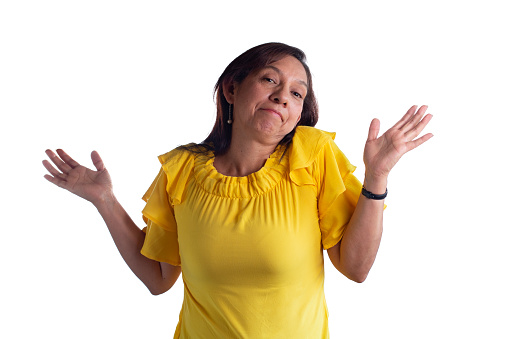 Latina woman isolated on a white background shrugging with a blank expression