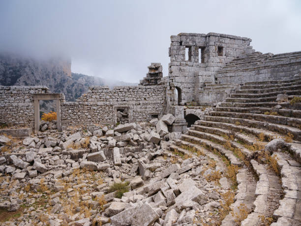 Termessos Ancient City, Turkey Autumn walk by ancient amphitheatre in city Termessos Ancient City, Turkey. Turkeys most outstanding archaeological sites and one of main tourist center. termessos stock pictures, royalty-free photos & images