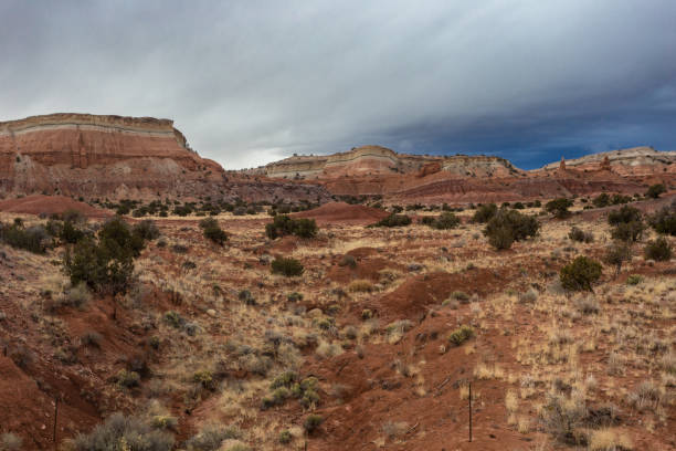 istock Gorgeous geological red rock formations with overcast sky in the high desert 1479351053
