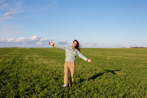 istock Long hair man in meadow 1479352290