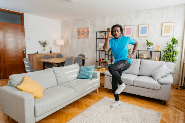 istock Young Man Exercising At Home 1479353381
