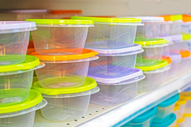 istock transparent plastic containers with colorful lids on the store counter, horizontal 1479353515
