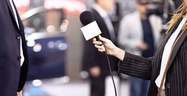 istock TV reporter holding microphone making press interview with unrecognizable person 1479353645