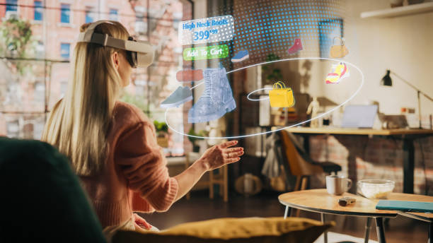 istock Woman at Home, Using Virtual Reality Headset for Online Shopping, Browsing through Pictures of Stylish Brand Shoes and Handbags. Scrolling Mock-up Internet Clothing Store App for e-Commerce products 1479354988