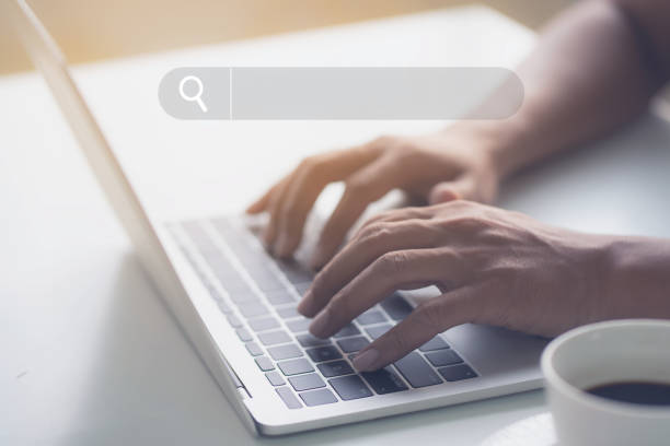 istock Men's hands are typing on the laptop's keyboard. 1479358089