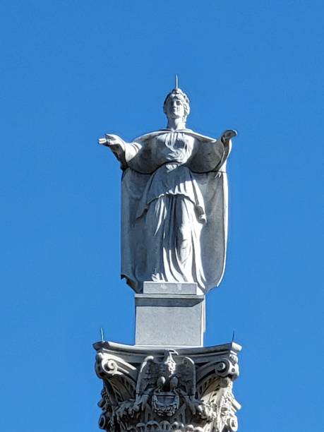 istock A vertical shot of an old statue under a blue sky 1479362145