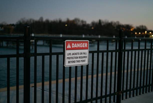 istock Fence with a sign warning about a danger outdoors 1479363340