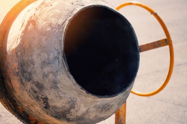istock Concrete mixer stands on construction site on sunny summer day. Construction and repair. Background. 1479368504