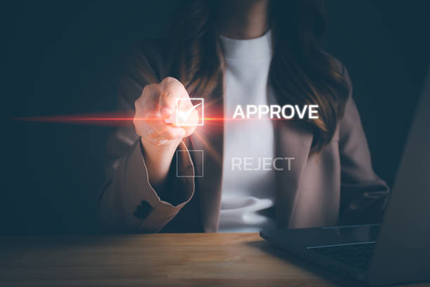 istock Businesswoman writing or tick correct mark to approve document and project concept. Quality Control or QC, Evaluation form, questionnaire, consideration, acceptance, approval, signing, Quiz, interview 1479371792