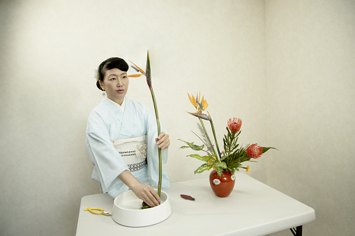 A Japanese woman who does flower arrangements at her studio.