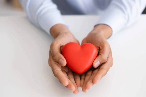 istock unrecognizable businessman holding heart shape 1479375762
