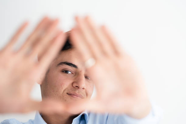 Free Stock Photo of Person holding blurred face with fingers | Download ...
