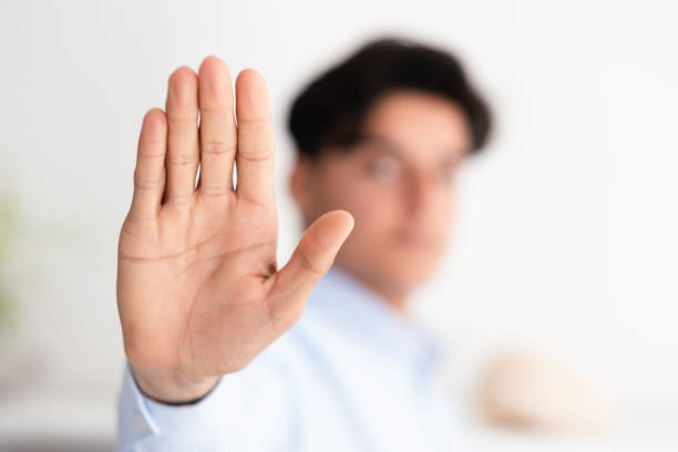 istock Businessman making a stop sign with his hand 1479375789