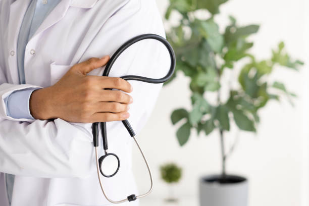istock Doctor crosses his arms and holds a stethoscope 1479375825