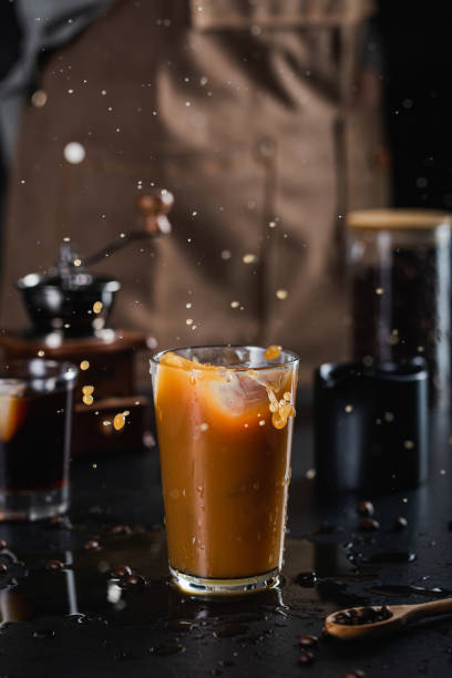 istock Selective focus shot of iced latte coffee with splashes 1479376959