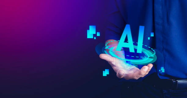 istock Businessman holding microchip processor with lights on the blue background. hologram digital chatbot, application, conversation assistant, AI Artificial Intelligence concept, digital chatbot on virtual screen. 1479379421