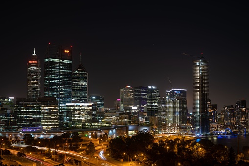 Perth, Australia – February 08, 2023: Brightly lit city buildings illuminated in the night time, creating a stunning skyline, Perth, Western Australia