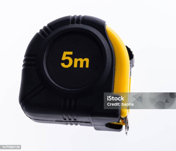 A Tape Measure On White Background Stock Photo - Download Image Now - Accuracy, Black Color, Carpentry