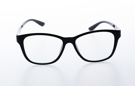 Black eyeglasses on white background