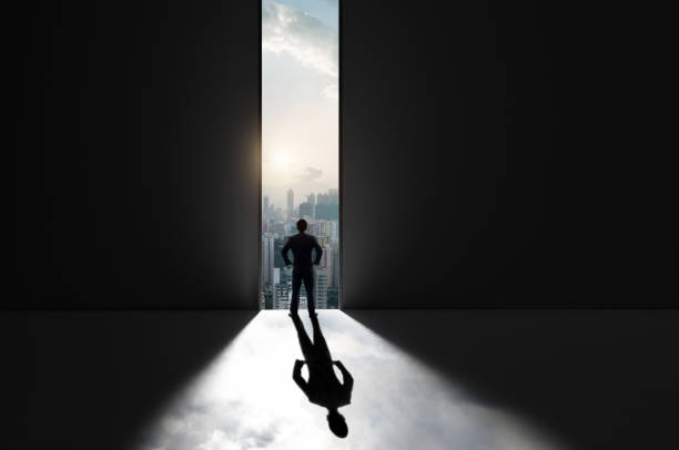 istock Businessman standing in front of open door 1479381030