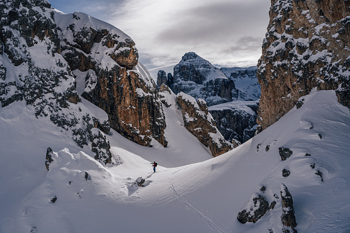 Ski touring in Dolomites, Italy. Skialpinism, touring on skis in winter wonderland of South Tyrol, Dolomites, Italy. Alto Adige, Gardena Pass.